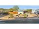 Charming home featuring a fenced yard with desert landscaping and a covered parking area at 13013 N 18Th St, Phoenix, AZ 85022