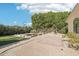 Expansive backyard featuring a basketball court, gravel area, and garden beds with manicured landscaping at 1330 N 40Th St # 1, Mesa, AZ 85205
