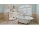 Beautiful bathroom featuring a glass shower and soaking tub at 1330 N 40Th St # 1, Mesa, AZ 85205
