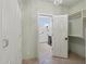 Closet doorway and bathroom doorway featuring decorative fixtures and tile floors at 1330 N 40Th St # 1, Mesa, AZ 85205