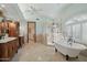 Elegant bathroom featuring a soaking tub, glass shower, and ample vanity space at 1330 N 40Th St # 1, Mesa, AZ 85205