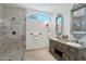 Primary bathroom with dual sink vanity and glass enclosed shower at 1330 N 40Th St # 1, Mesa, AZ 85205