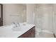 Functional bathroom featuring a vanity with a white countertop and a walk-in shower at 1330 N 40Th St # 1, Mesa, AZ 85205
