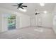 Spacious bedroom featuring shuttered windows and access to the outdoor pool area at 1330 N 40Th St # 1, Mesa, AZ 85205