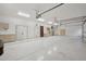 Large garage space featuring storage cabinets and multiple entry points at 1330 N 40Th St # 1, Mesa, AZ 85205