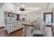 Elegant kitchen with a large island, breakfast bar, and custom cabinetry at 1330 N 40Th St # 1, Mesa, AZ 85205