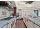Gourmet kitchen featuring custom cabinets, a large island, and high-end appliances at 1330 N 40Th St # 1, Mesa, AZ 85205