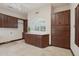 Beautiful laundry room with custom cabinetry, countertops, and ample storage at 1330 N 40Th St # 1, Mesa, AZ 85205