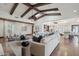 Bright and airy living room with vaulted ceilings, wooden beams, and an open floor plan at 1330 N 40Th St # 1, Mesa, AZ 85205