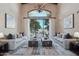 Elegant living room with large windows, comfortable seating, and a stylish rug at 1330 N 40Th St # 1, Mesa, AZ 85205