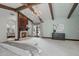 Bright main bedroom with beamed ceilings, fireplace, and walkout to patio at 1330 N 40Th St # 1, Mesa, AZ 85205