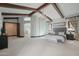 Spacious main bedroom boasts beamed ceilings, neutral tones, and ensuite bathroom access at 1330 N 40Th St # 1, Mesa, AZ 85205