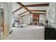 Spacious main bedroom with a fireplace, sitting area, beamed ceilings and a large walk-in closet at 1330 N 40Th St # 1, Mesa, AZ 85205