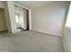 Bedroom with neutral-colored walls, a large mirror closet and soft, comfortable carpeting at 1354 S 228Th Dr, Buckeye, AZ 85326