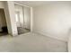 Bedroom featuring neutral carpet and sliding mirror door closet at 1354 S 228Th Dr, Buckeye, AZ 85326