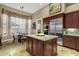 Bright breakfast nook adjacent to the kitchen with stainless appliances and ample natural light at 14708 E Canyoncrest Ct, Fountain Hills, AZ 85268