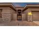 Charming entrance with courtyard gate, stone accents, and walkway at 14708 E Canyoncrest Ct, Fountain Hills, AZ 85268