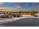 Well-maintained home exterior featuring desert landscaping, sidewalk and a convenient two car garage at 14708 E Canyoncrest Ct, Fountain Hills, AZ 85268