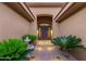 Inviting entryway with manicured landscaping and walkway leading to the beautiful front door at 14708 E Canyoncrest Ct, Fountain Hills, AZ 85268