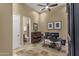 A home office features a piano, desk with two monitors, and an ensuite bathroom with a glass shower at 14708 E Canyoncrest Ct, Fountain Hills, AZ 85268