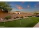 Backyard putting green features desert landscaping for a relaxed outdoor experience at 14708 E Canyoncrest Ct, Fountain Hills, AZ 85268