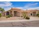 Inviting single-story home featuring desert landscaping, complemented by a tile roof and neutral exterior at 15827 S 12Th Pl, Phoenix, AZ 85048