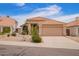 Charming single-story home featuring a tile roof, desert landscaping, and a spacious two-car garage at 15827 S 12Th Pl, Phoenix, AZ 85048