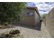 Desert landscaped backyard featuring mature landscaping and block wall at 1742 E Chaparral Dr, Casa Grande, AZ 85122