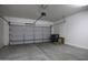 Spacious garage featuring an automatic door opener, ample room for parking, and extra storage at 1742 E Chaparral Dr, Casa Grande, AZ 85122