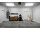 Large garage with water heater, storage, and ample space for multiple vehicles at 1742 E Chaparral Dr, Casa Grande, AZ 85122