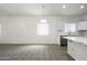 Spacious living room that features tiled floors, a large window, and bright overhead lighting at 1742 E Chaparral Dr, Casa Grande, AZ 85122