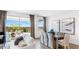 Elegant dining room with large windows offering abundant natural light and views of the outdoor space at 17479 W Victory St, Goodyear, AZ 85338