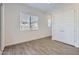 Bright bedroom with ample natural light, closet space, and neutral tones creating a serene and inviting atmosphere at 17545 W Victory St, Goodyear, AZ 85338