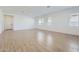 Expansive living area with multiple windows, providing abundant natural light and creating an airy atmosphere at 17545 W Victory St, Goodyear, AZ 85338