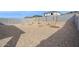 Spacious backyard with rock landscaping and trees at 17806 W Vogel Ave, Waddell, AZ 85355
