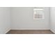 A sunlit bedroom with neutral carpet and freshly painted walls at 17806 W Vogel Ave, Waddell, AZ 85355