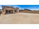Spacious backyard featuring block wall and patio, perfect for outdoor living and entertaining at 18759 E Panchito Dr, Gold Canyon, AZ 85118