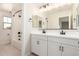 The bathroom features dual sinks, tile floors, and tub with shower at 18759 E Panchito Dr, Gold Canyon, AZ 85118