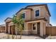 Two-story home with desert landscaping, brown garage doors, and front entry at 18759 E Panchito Dr, Gold Canyon, AZ 85118