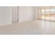 Bright, open-concept living space with modern flooring and sliding glass doors at 18759 E Panchito Dr, Gold Canyon, AZ 85118