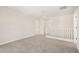 Carpeted upstairs loft area with access to multiple bedrooms and stairway at 18759 E Panchito Dr, Gold Canyon, AZ 85118