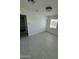 Neat bedroom with a window and tiled floors, plus a closet with shelving at 1915 W Missouri Ave, Phoenix, AZ 85015