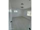Cozy bedroom with neutral walls, new flooring and two windows to allow for lots of light at 1915 W Missouri Ave, Phoenix, AZ 85015