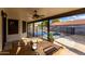 Covered patio with ceiling fan and views of the fenced pool and backyard at 2149 E Hermosa Vista Dr, Mesa, AZ 85213