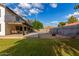 View of backyard, pool, patio, grassy area and mature trees at 2149 E Hermosa Vista Dr, Mesa, AZ 85213