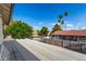 This balcony offers views of the mature landscaping at 2149 E Hermosa Vista Dr, Mesa, AZ 85213