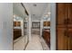 Spacious bathroom with dual sinks, marble countertops, and a separate tub at 2149 E Hermosa Vista Dr, Mesa, AZ 85213