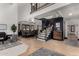 Elegant foyer featuring a grand staircase, and designer accents at 2149 E Hermosa Vista Dr, Mesa, AZ 85213