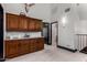 Bright hallway features a wall of wood storage cabinets with granite countertops at 2149 E Hermosa Vista Dr, Mesa, AZ 85213