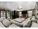 Comfortable living room showcases brick fireplace and built-in cabinets, and ample natural light at 2149 E Hermosa Vista Dr, Mesa, AZ 85213